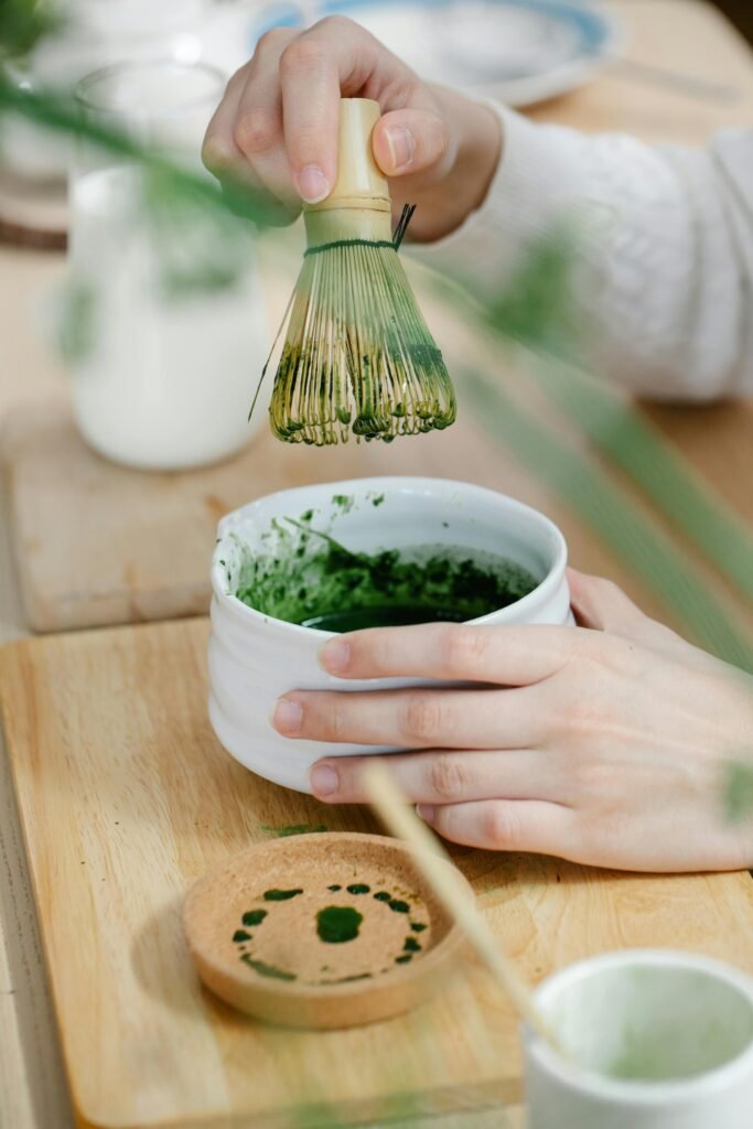 whisking matcha